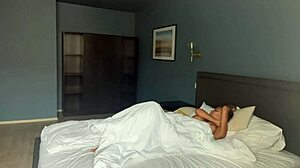 Beautiful Monika Fox wakes up teasing with fake big tits posing pierced and tattooed in morning ritual. She smears cream seductively.