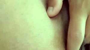 Sexy morena masturbates her hairy vagina with intense passion in close-up view.