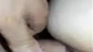 he plays with his wife's pussy, fingering her while she masturbates