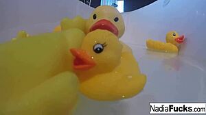 i'm sexy nadia, bathin' with rubber duckies, playin' with my big tits and pussy solo
