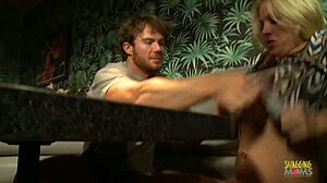 Blonde milf's shaved pussy teased under desk sparks intense urge for reverse cowgirl action