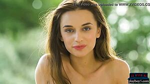 Watch this brunette babe striptease outdoors