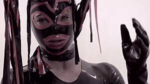 Masked shemale in latex dominates with hardcore cock play