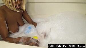 msnovember innocent brown skin black girl washing up in bathtub with rubber ducky big areolas on natural boobs hangers and dark nipples sheisnovember hd