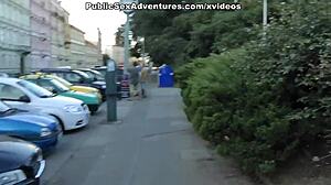 brunette flaunts nice tits naked on public street