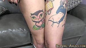 Tattooed goth slut sucking cock in POV blowjob.