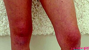 Charming petite blonde girls tease intensely on sofa during photoshoot.