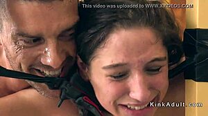 Cute dark-haired slave takes it hard anally