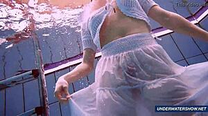 Marketa stuns with hairy underwater show in Polish beach scene.