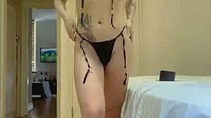 ariana dances gracefully in her micro bikini