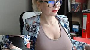hey, this sexy blond babe is going solo with her big tits, such a nerdy turn-on! 😏