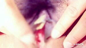 i suck and pinch the clitoris to make her squirt orgasm