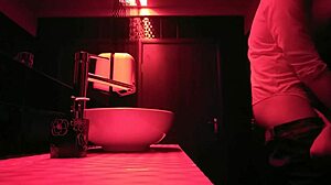 A couple enjoys passionate sex in the bathroom.