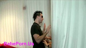 Clothed females dominate naked male in kinky play