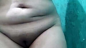 Hot busty stepmom touches herself while bathing!