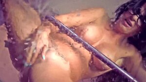 Hot brunette fingers her wet pussy while masturbating solo on the couch with toys