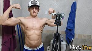 Watch this cute twink flex muscles and cum in the bathroom