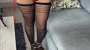 Kenia teases in black stockings and red satin dress! 🔥