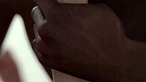 Black guy eagerly sucks huge white cock in intense blowjob.