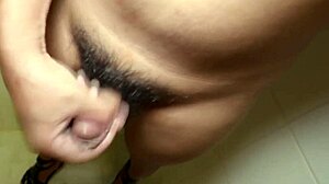 Aiko the shemale engages in detailed crossdressing shower play with amateur touches