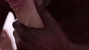 Black guy eagerly sucks huge white cock in intense blowjob.