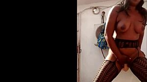 Masked ebony slams herself with a huge dildo standing outside her beach house. Part 2 unfolds raw intensity.