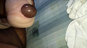 In this gay scene, placing it in the doll with care.