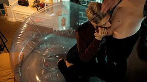 Two sweet guys share an inflatable chair, relaxing together in a casual setting