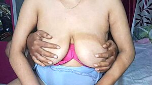 Hot Indian Desi Bhabhi Massages Big Boobs with Oil