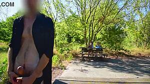 What happens at this public outdoor picnic with amateurs in shorts showing natural tits?