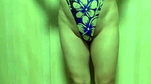 gorgeous gold leotard babe trains with long anal plug, wow!