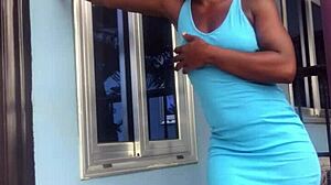 crazy bitch twerking on the balcony, showing off her moves outdoors