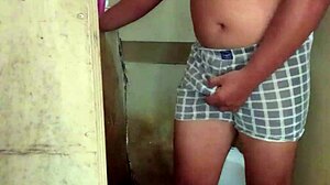 man prepares for shower with handjob