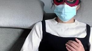 this asian milf in transparent stockings seduces with her big tits