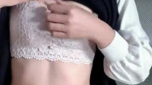 this asian milf in transparent stockings seduces with her big tits