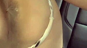 Blonde babe licks ass and gives foot job in public car.