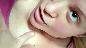 blonde woman invites video call from bed