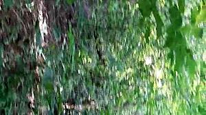 Brunette lesbians lick pussy in woods until climax.