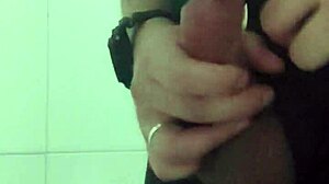 is the security guard masturbating in the bathroom?