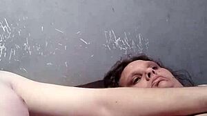 Step mom whispers, 'Johnny, give me that handjob with your big cum!' while teasing her big natural tits in homemade fetish sex.