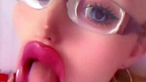Huge pink lips transform crossdressing bimbo into fetish fuck doll