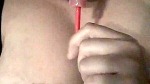 I'm sucking this lollipop while playing with my tits.