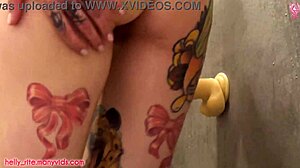 Tattooed solo girl uses dildo for tight anal in shower