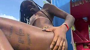 A pretty petite girl flashes in public in Jamaica.