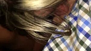 Mature tattooed blonde milf sucks petite young cock outdoors in public.