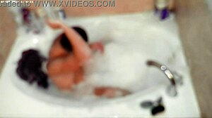 A young asian amateur enjoys a relaxing bubble bath in the bathroom, showcasing his feet and naked body.