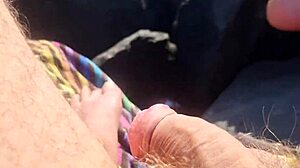 This skinny bodybuilder guy gets a crazy public handjob from the old cuckold fetish friend. Spitting and feet play make it wild in the open.