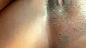 She feels intense pleasure enjoying the big black cock deep inside her.