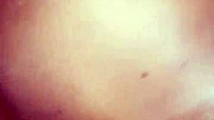 She feels intense pleasure enjoying the big black cock deep inside her.