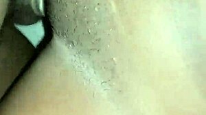 She feels intense pleasure enjoying the big black cock deep inside her.